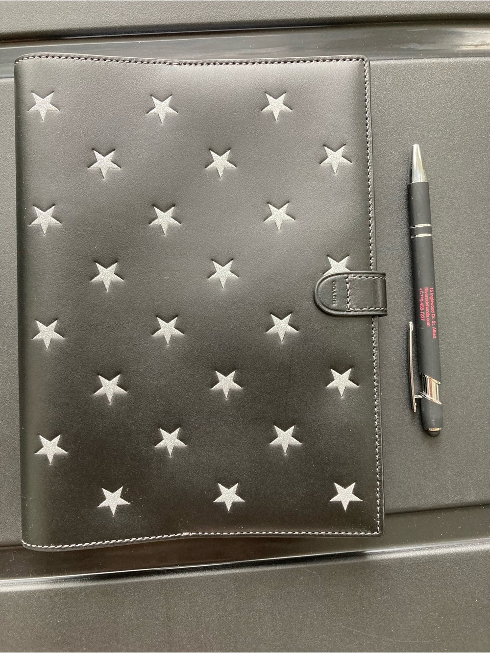 Coach Black Star-Embossed Leather Notebook Folio